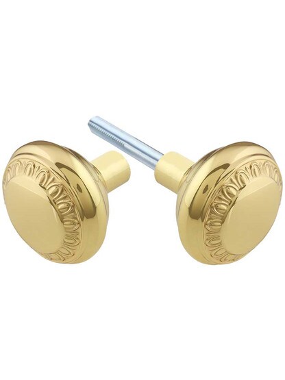 Pair of Ovolo Door Knobs in Polished Brass.